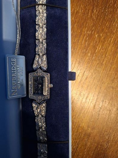 Newbridge Silver Butterfly Watch - This is a gift that was never worn so it should be passed on to somebody who will wear it and enjoy it, as it a stunning little watch with beautifull butterfly diamond detailing on the straying. It has just had a new bat