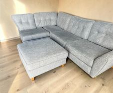Grey corner sofa with matching footstool