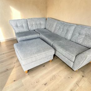 Grey corner sofa with matching footstool