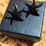 Small Shiny Earrings with Black Starfish Motif Elegant Minimal Style Image 3