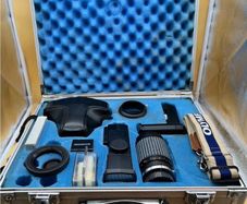 A Cased Olympus OM-10 Set