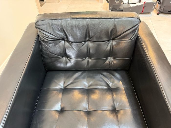 Black Leather Armchair and Matching Ottoman Footstool