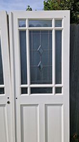 Matching set of 2 solid Oak double doors with stippled glass.