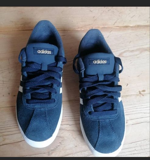 Never worn. Adidas runners