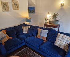L shaped sofa/couch, blue velvet.
