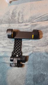 Phone holder for tripod