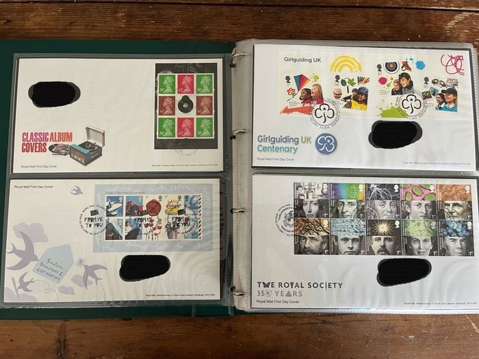 Collection of  77 UK First Day Cover stamps 2010 to 2013 in album