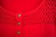 Red tunic.