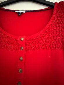 Red tunic.