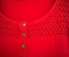 Red tunic.