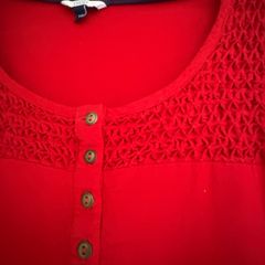 Red tunic.