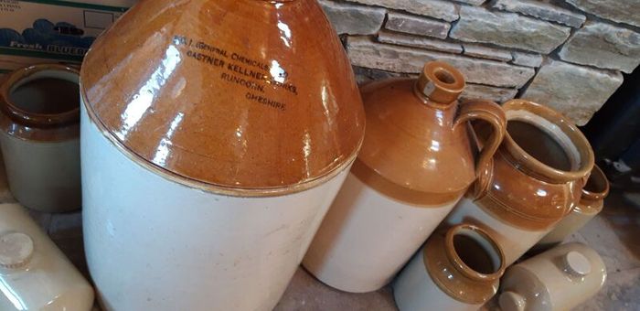 Collection of Eight Antique Stoneware Jars including Two Antique Hot Water Bottles