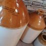 Collection of Eight Antique Stoneware Jars including Two Antique Hot Water Bottles Image 8
