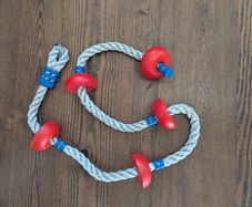 Outdoor kids climbing rope