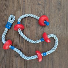 Outdoor kids climbing rope
