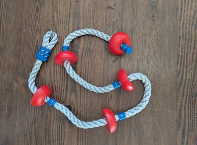 Outdoor kids climbing rope
