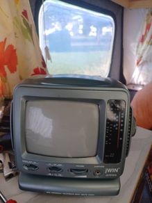 T V