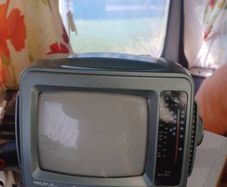 T V