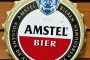 Amstel metal wall bottle cap