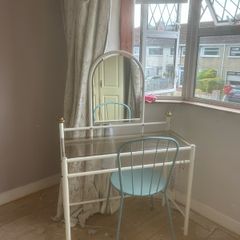 dresser with mirror and chair