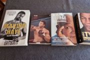 Four boxing books.