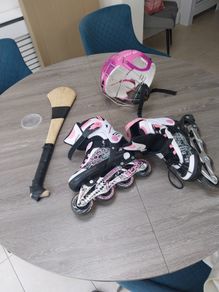 child's Hurley , helmet and skates