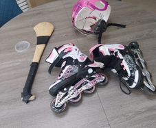 child's Hurley , helmet and skates