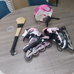 child's Hurley , helmet and skates