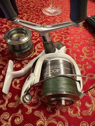 shimano stradic 4000 with spare spool and spiderwire braid
