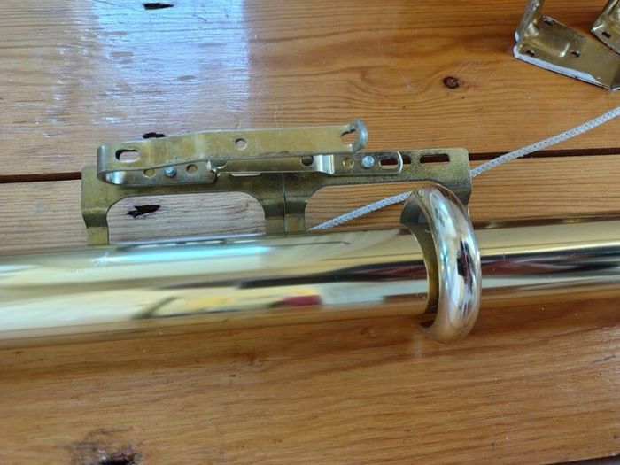 Brass coloured curtain track