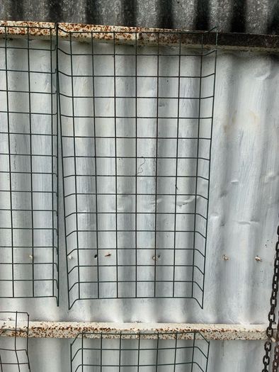 6 wire plant holders and 2 lawn plant protectors