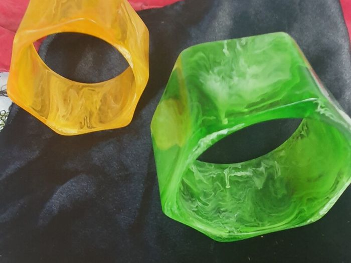2 vibrantly colored plastic bangles