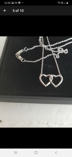 new silver hearts pendant with real diamonds