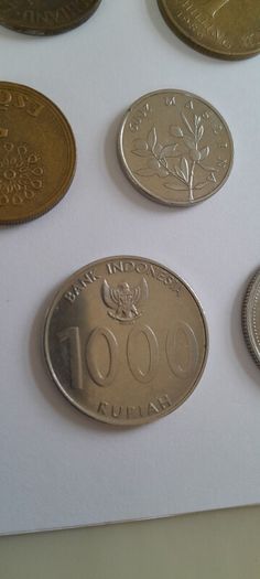 Coins a mix of different countries 28 coins in total registered post included
