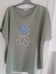 ladies new with tags olive  green in colour