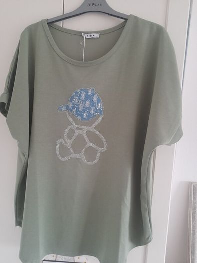 ladies new with tags olive  green in colour