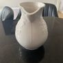 Vintage ceramic pitcher with embossed decoration Image 3