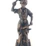 Vintage metal figurine of a blacksmith Image 2