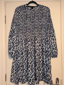 Stunning animal print long sleeve midi dress