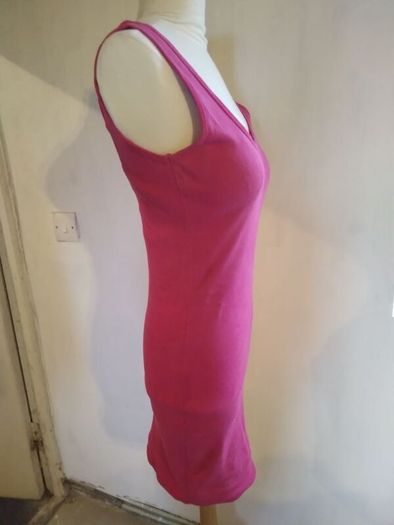 Stretch Dress,figure hugging.Size 12 Brand New.