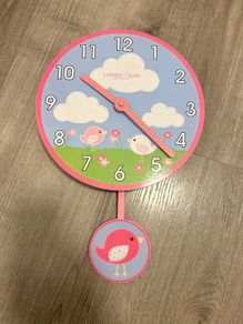 Kids clock with pendulum