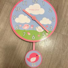 Kids clock with pendulum