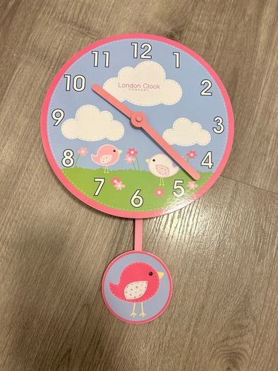 Kids clock with pendulum