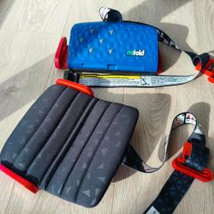 Two mifold portable booster seats - blue and purple