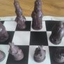 Andux Alice in Wonderland Chess Set with Leatherette Board & Wooden Box Image 2