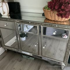 Mirrored sideboard with three doors and drawers
