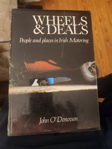 Wheels And Deals. People And Places In Irish Moterong. By John O' Donovan. First Edition Hardback With Dustjacket In Good Condition.