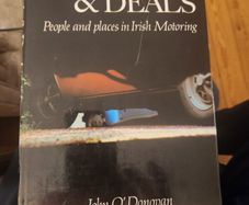 Wheels And Deals. People And Places In Irish Moterong. By John O' Donovan. First Edition Hardback With Dustjacket In Good Condition.