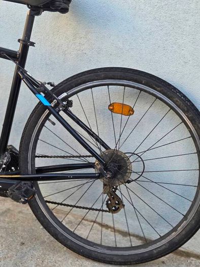 Two bikes one mountain one is a type of racing mountain bike