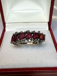 Beautiful vintage silver ring with natural rubies and diamonds.
